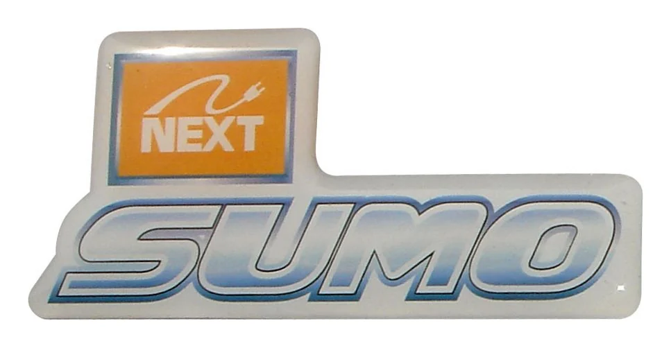 NEXT SUMO vehicle badge produced as a contour-cut dome label